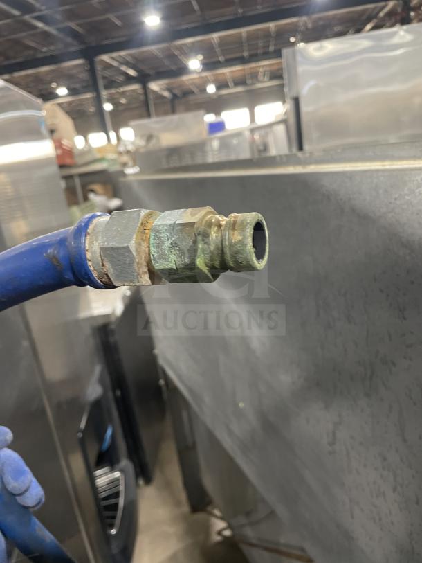 US Range commercial stainless steel gas griddle/broiler, Model PX-6-24BG-2626, with 6 burners, 2 ovens, on casters.