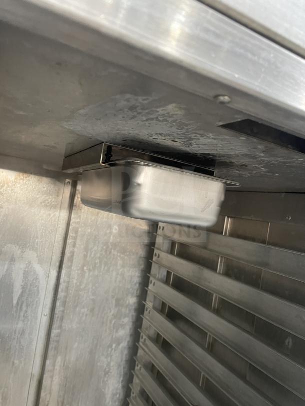 Metro C200N stainless steel heated holding cabinet interior, showing holding racks and digital controls. Good condition.