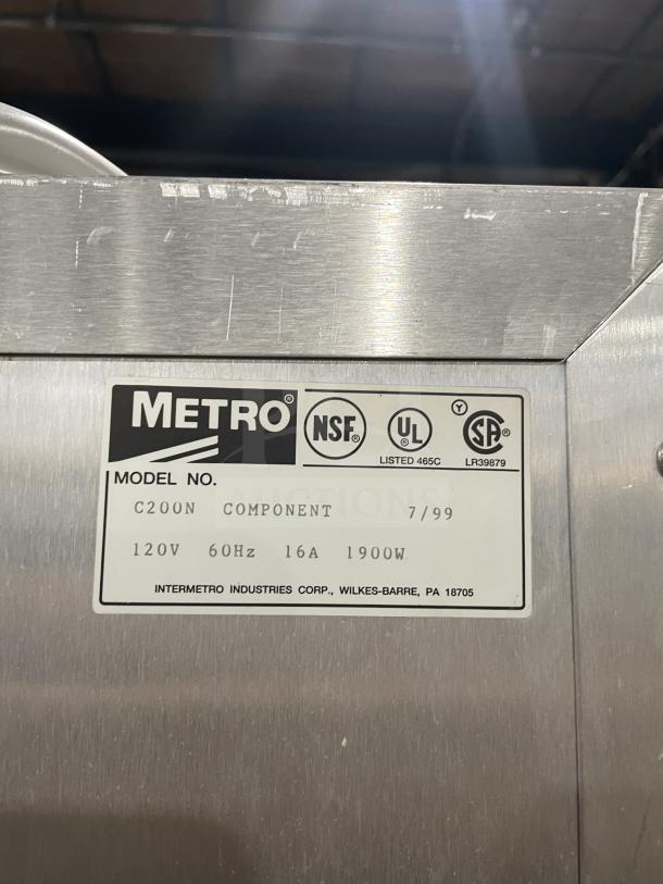 Metro C200N stainless steel electric heated holding cabinet, half-door, digital controls, with racks, on casters, NSF certified.