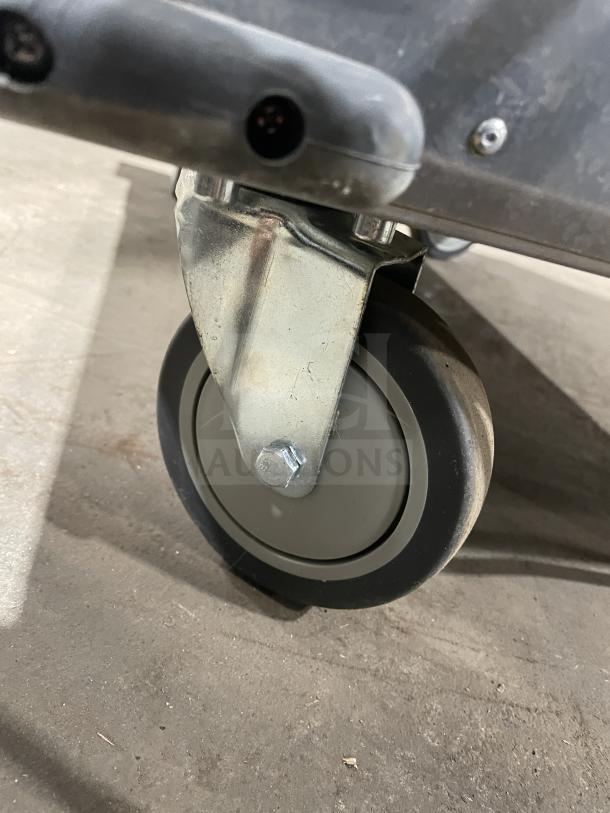 Bevles HPIC-6836 commercial warming cabinet on caster wheels.