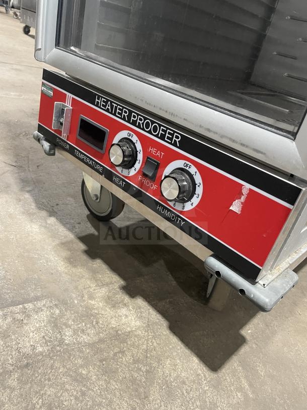 Bevles HPIC-6836 stainless steel warming/proofing cabinet, 120V, on casters, glass door, control knobs visible, good condition.