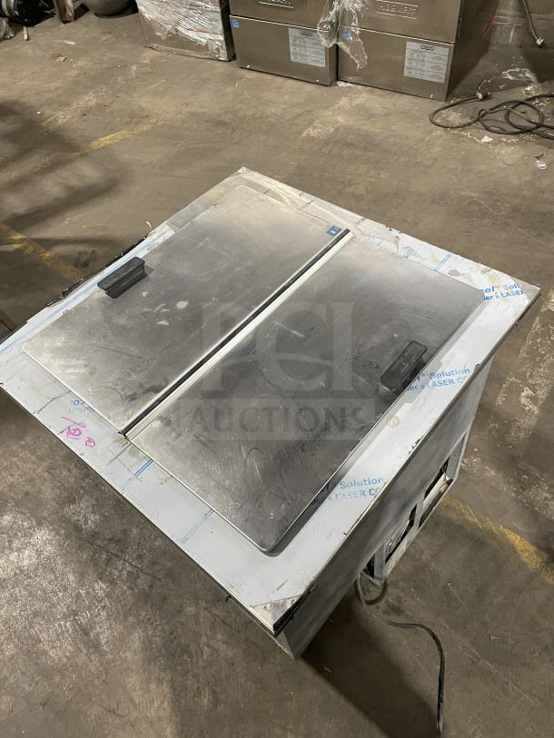 Randell 9552A stainless steel drop-in freezer/plate chiller, electric, 115V, used condition, top view with visible panels.