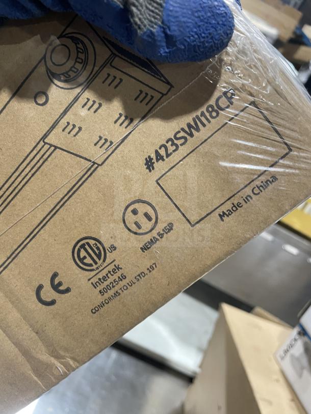 Servit 423SWI18CP Commercial Electric 18" Strip Warmer in packaging; features infinite controls; labels indicate certifications and origin.