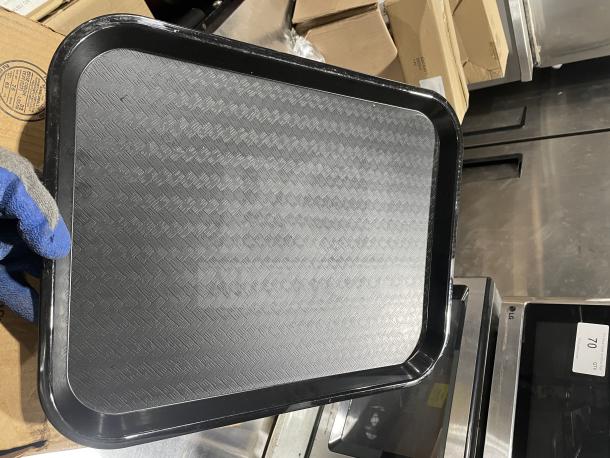 Black 14"x18" Carlisle fast food tray, model NCT1418, brand new condition, textured surface.