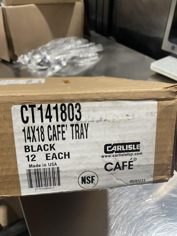 Box of Carlisle 14"x18" black cafe trays. NSF certified, 12 trays per box. Brand new, made in USA.