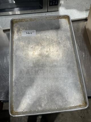Focus Food Service stainless steel baking sheet, used condition, 14x11 size tag visible, ideal for bulk bidding.