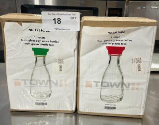 Two boxes containing Town commercial food service glass soy sauce bottles. Left box: 1 dozen 6 oz bottles with green tops. Right box: 1 dozen 5 oz bottles with red tops. Made in China.