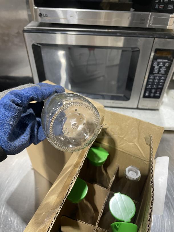 New Town 6oz glass soy sauce bottles in box, commercial use, green caps, excellent condition, SN: 843784003849.