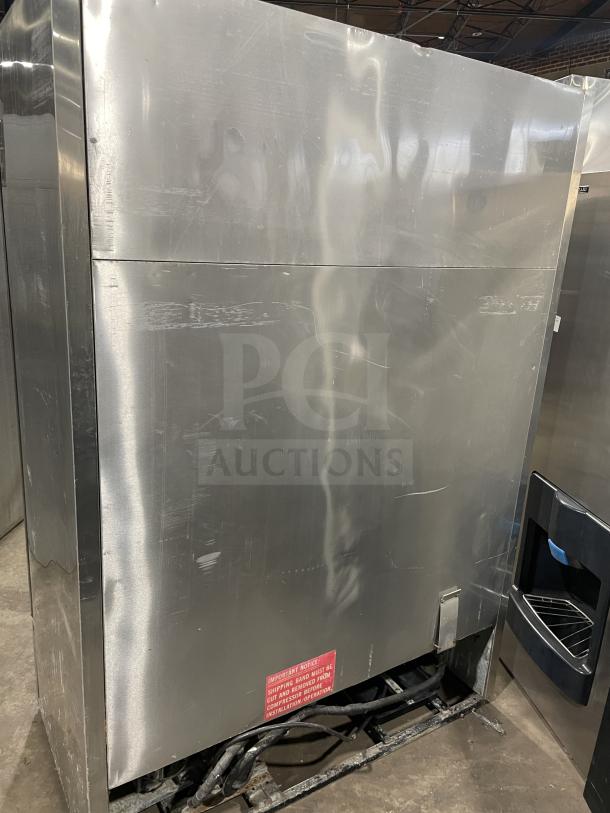 True T-49F stainless steel double door commercial freezer, Energy Star certified, with poly-coated wire racks, 115V, 1 phase.