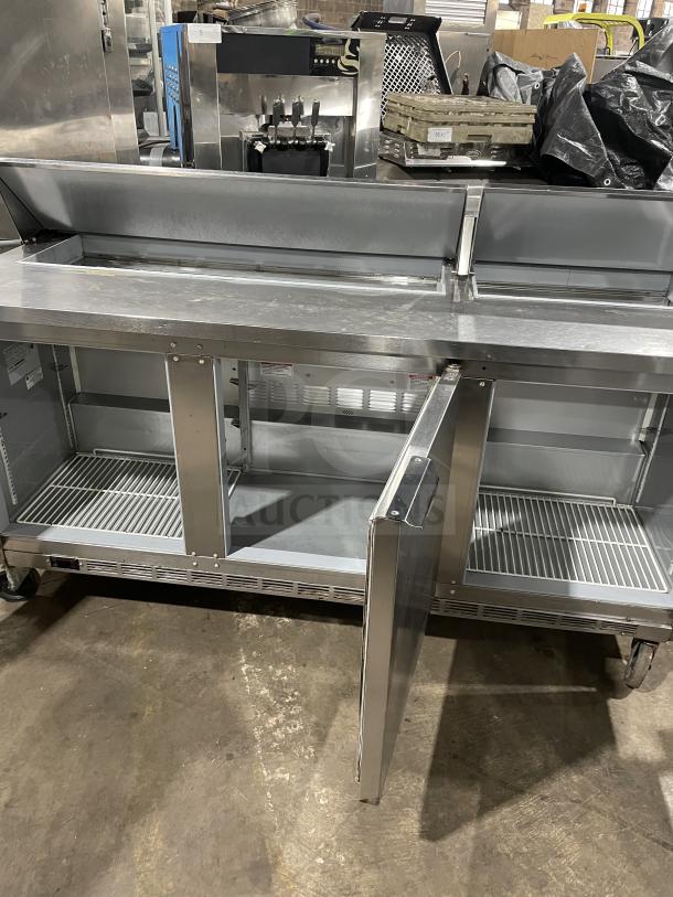 Beverage Air SPE72HC-18 stainless steel pizza prep table, 3-door refrigerator, on casters, good condition, commercial use.
