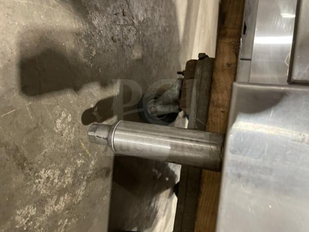 Rankin Delux stainless steel countertop gas char broiler grill with back and side splashes, visible leg, good condition.