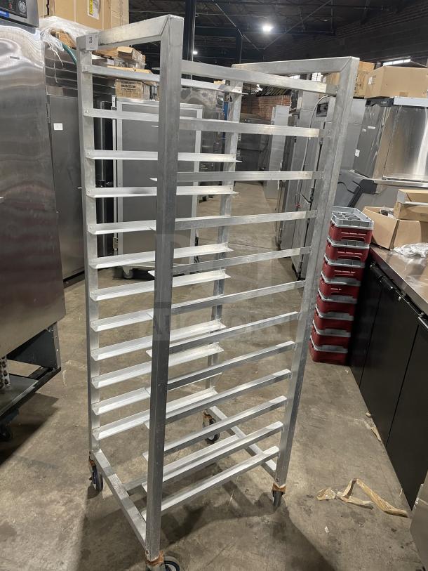 Alexander Industries commercial aluminum 12-pan sheet rack, heavy-duty, on casters, excellent condition, ideal for kitchens.
