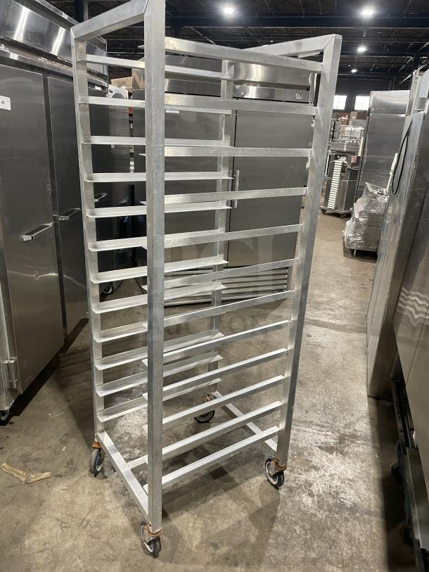 Alexander Industries commercial aluminum 12-pan sheet rack on casters, heavy-duty design, excellent condition.
