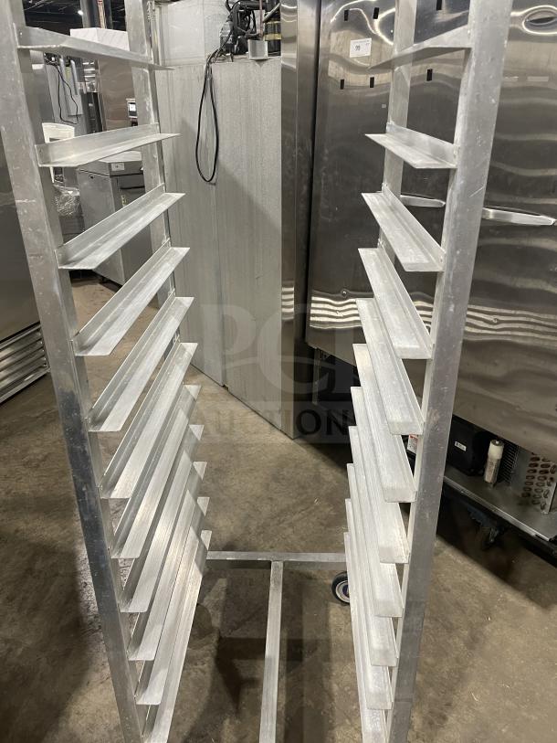 Alexander Industries commercial 12-pan sheet rack, heavy-duty aluminum, on casters, excellent condition.