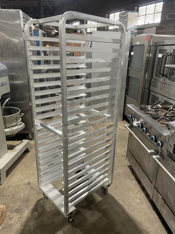 Alexander Industries aluminum 12-pan bun rack with casters, commercial-grade, excellent condition, sturdy construction.