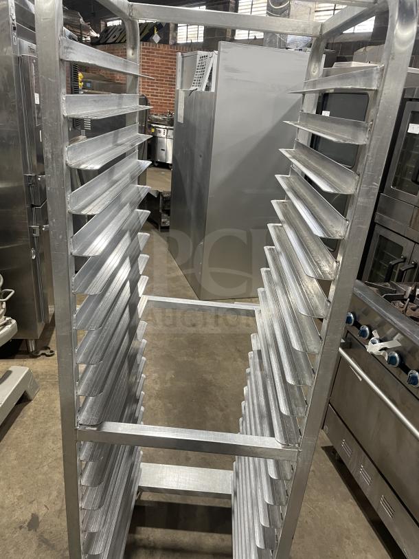Alexander Industries aluminum 12-pan rack, heavy-duty, commercial use, on casters. Excellent condition.