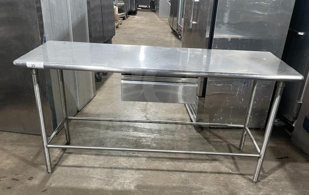 Stainless steel work prep table with under-shelf, in excellent condition. Tag marked "25". Durable for kitchen use.