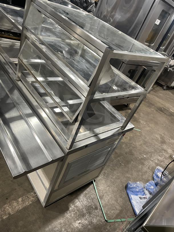 Atlas Metal Industries stainless steel buffet-style steam table with sneeze guard, model WCM-BT-4, on casters.