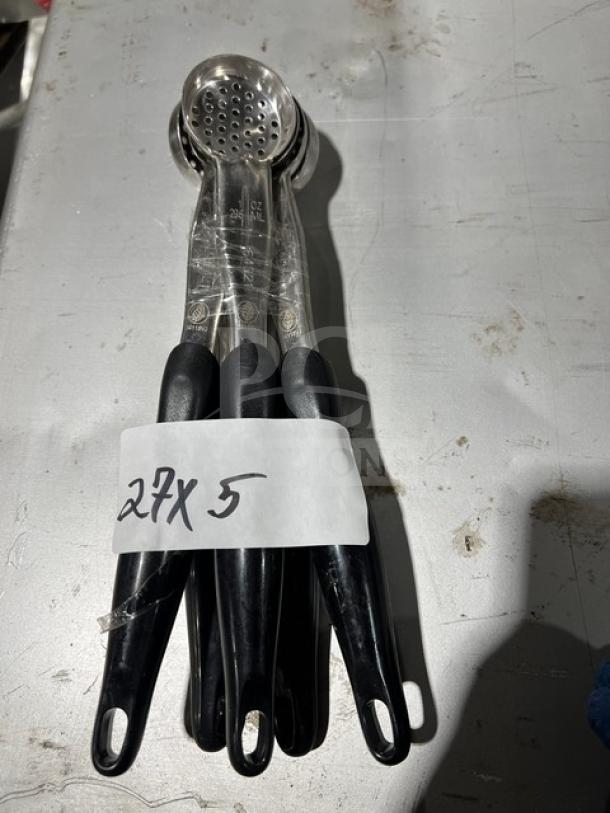 Vollrath Jacob's Pride 1 oz stainless steel perforated spoodle, model 34118VJ, with black grip handle, labeled "27 X 5".