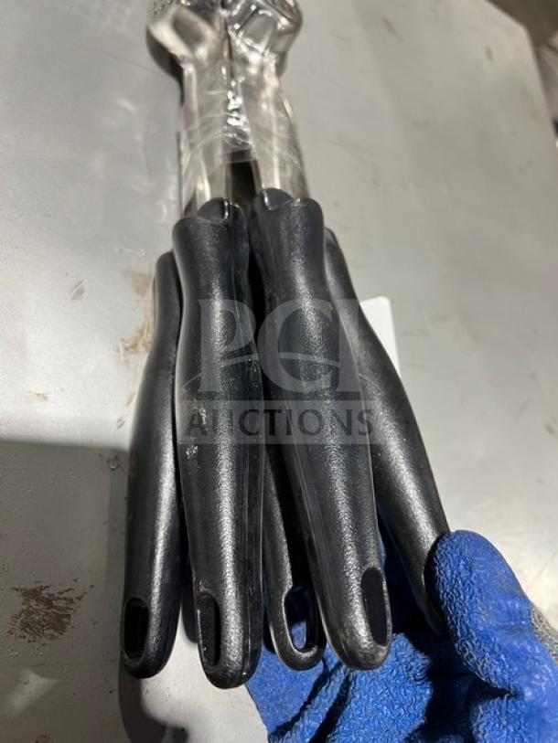 Vollrath Jacob's Pride stainless steel perforated spoodle, 1 oz, Model 34118VJ, with black grip handle, in good condition.