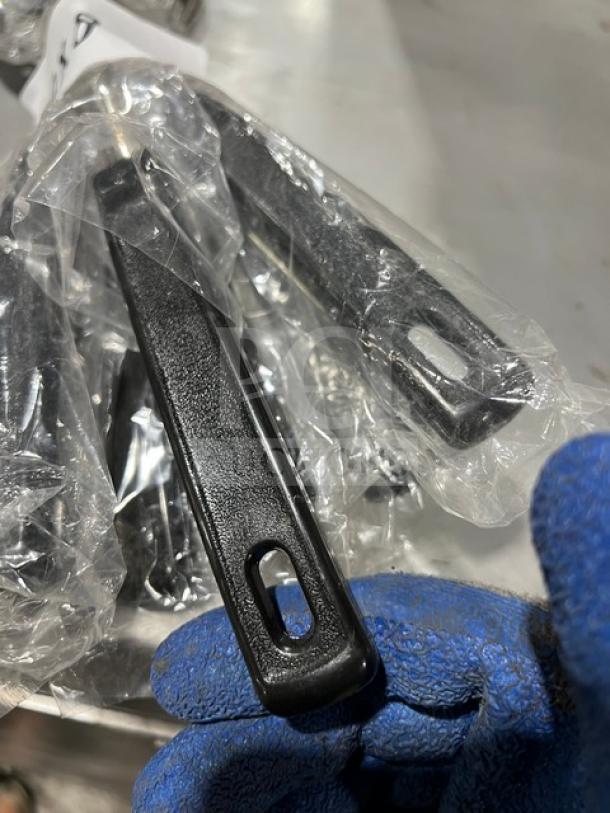 Vollrath 46946 stainless steel spoodle, black grip, commercial-grade, perforated, pristine condition, portion control tool.