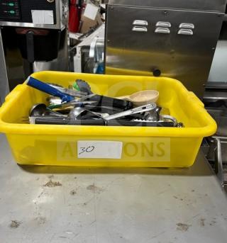 Yellow bin with Winco TR34W kitchen tools, including spoons and tongs, used condition, labeled "30."