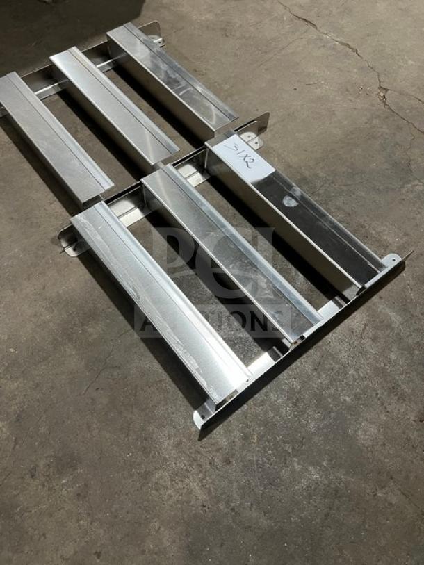 Stainless steel commercial side smoker/refrigeration racks, polished finish, label reads "2XR". Excellent condition.