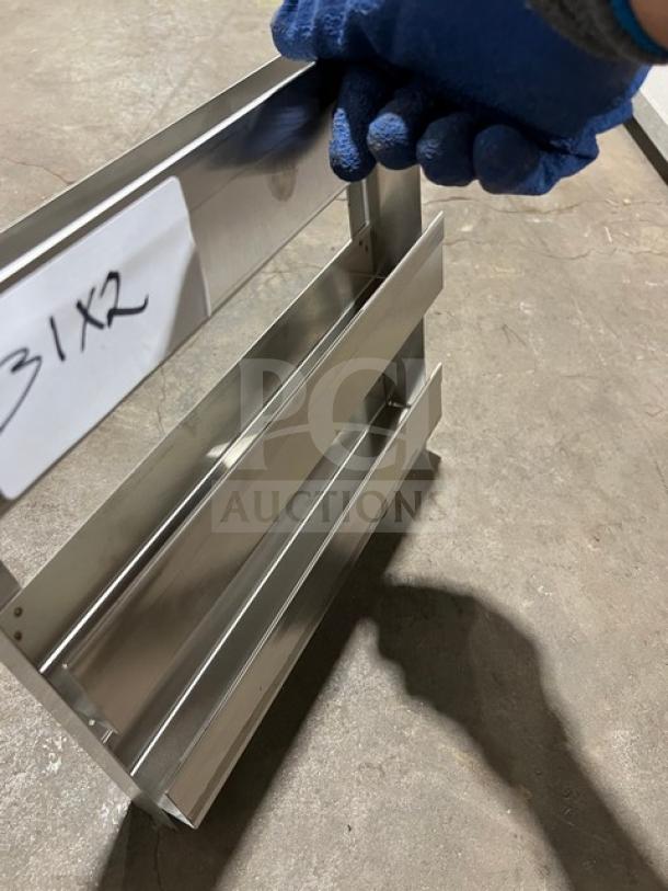 Commercial side smoker/refrigeration rack, stainless steel, new condition. Visible label: "31X2". Auction includes two racks.