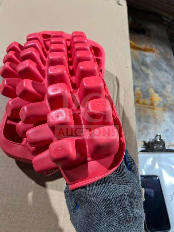 Lekue commercial silicone ice cube tray, red, in good condition, flexible design for easy ice removal, holds multiple cubes.