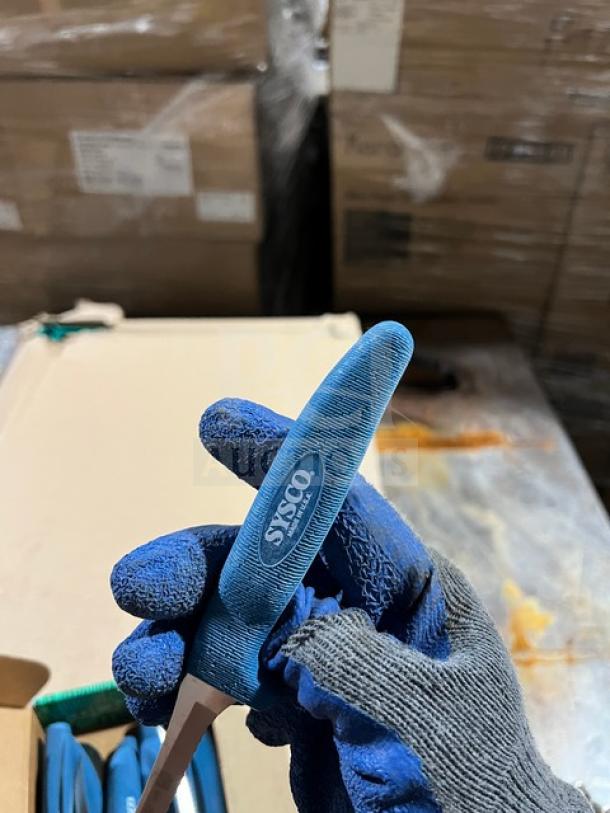 Sysco stainless steel steak knife with blue Ergogrip handle, commercial quality, brand name visible, well-maintained condition.