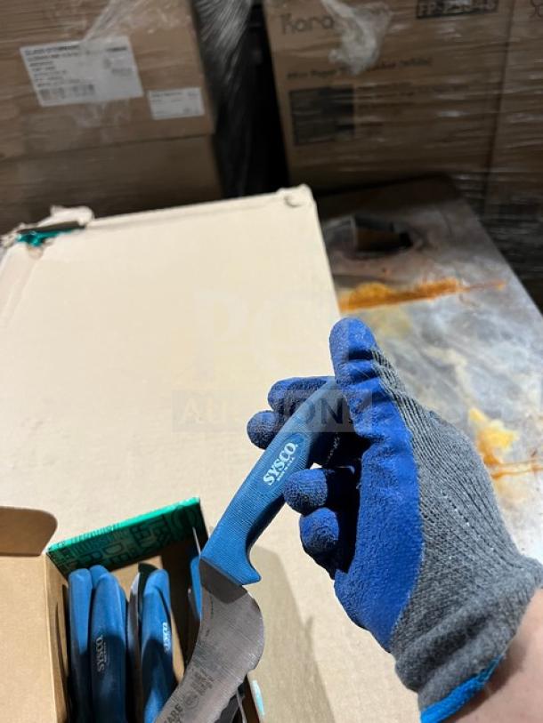 Sysco commercial stainless steel steak knife with blue Ergogrip handle, new condition, visible branding on handle.