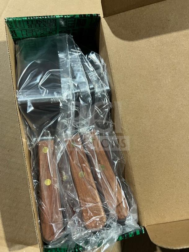 New Dexter Russell S254 stainless steel offset spatula with orange grip handle, commercial-grade, in original packaging.