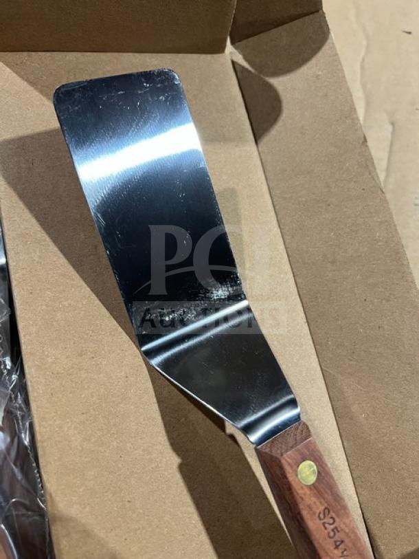 Dexter Russell Series S254 stainless steel offset spatula with orange grip handle, new condition.