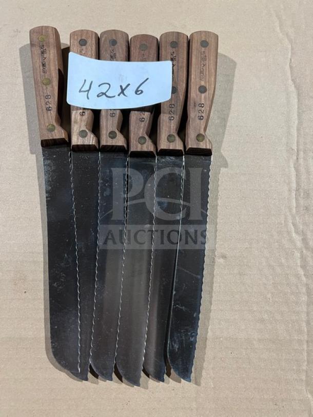 Dexter Russell stainless steel bread knife, model 628, with wooden grip. Features serrated blade. Includes multiple knives.