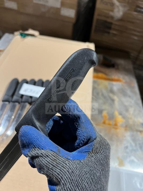 Dexter Russell Sani-Safe Series paring knife, model S104B-PCP, with black grip handle. Stainless steel blade, 3.25 inches.