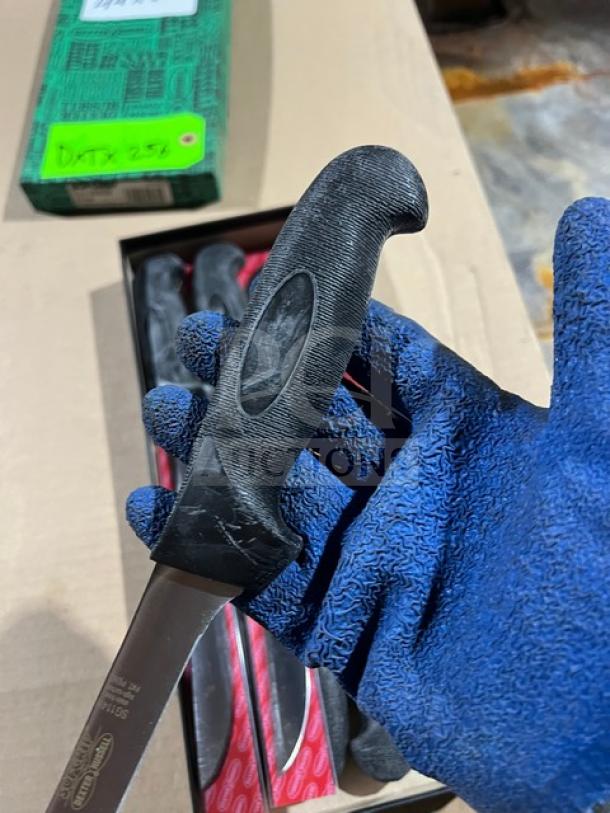 Dexter Russell Sani-Safe stainless steel 16" paring knife, model S104B-PCP, with black grip handle, new condition.