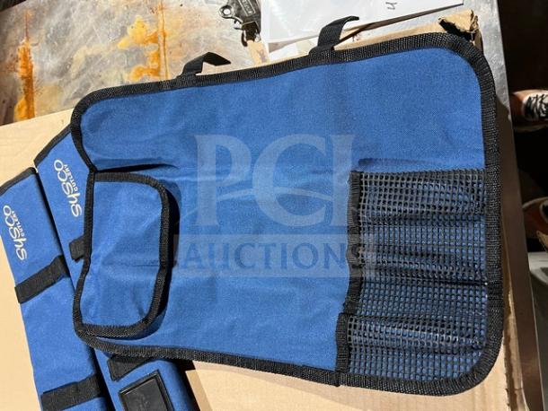 Sysco Cutlery commercial blue knife guards with mesh pockets, new condition. Logo visible on blue fabric.