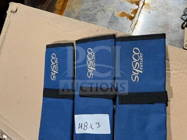 Three Sysco Cutlery commercial blue knife guards with Velcro closures, labeled "U8 x 3," in excellent condition.