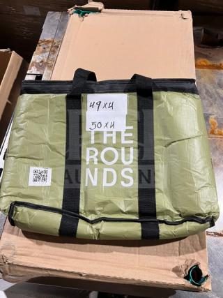 Reusable green delivery bag by The Rounds, commercial use, features black straps, includes QR code and size markings.