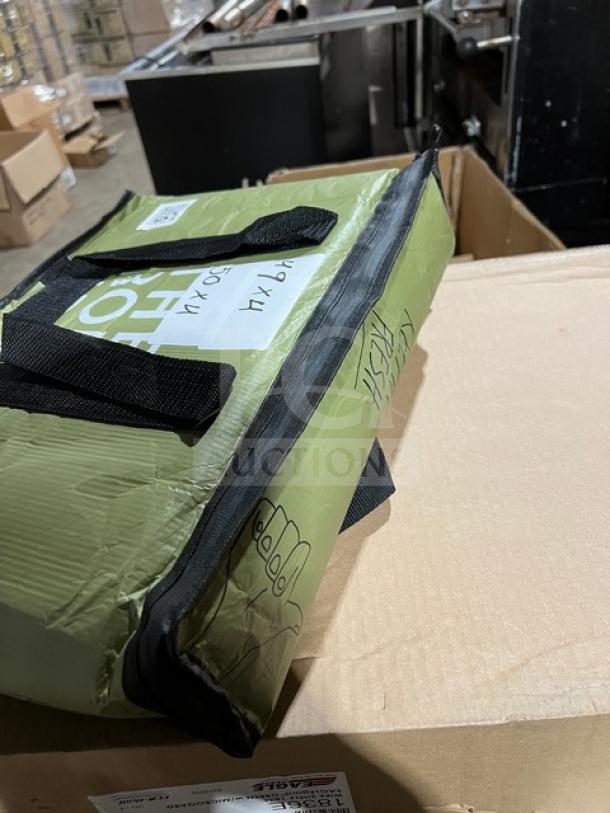 The Rounds reusable green delivery bag in good condition, features black handles and branded logo.