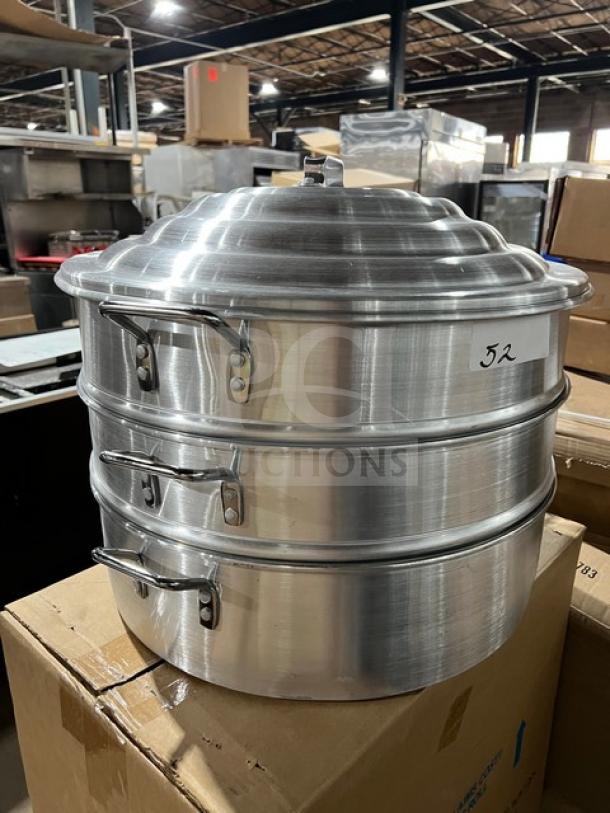 New commercial stainless steel food steamer with three tiers, featuring sturdy handles and a durable design, marked "52".