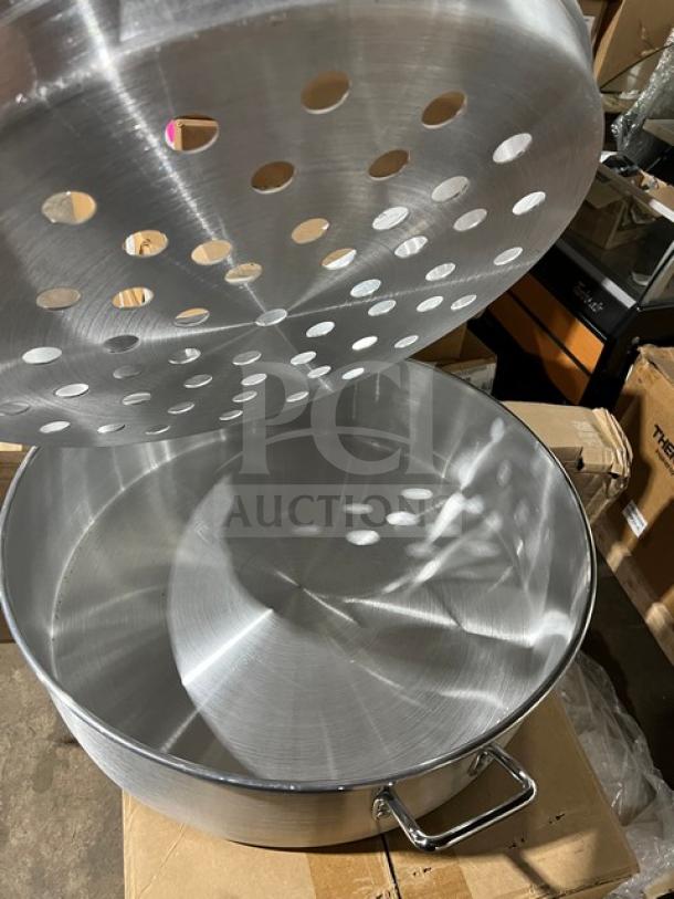 New commercial stainless steel food steamer with 3-tier design, perforated tiers, pristine condition, metal handles.