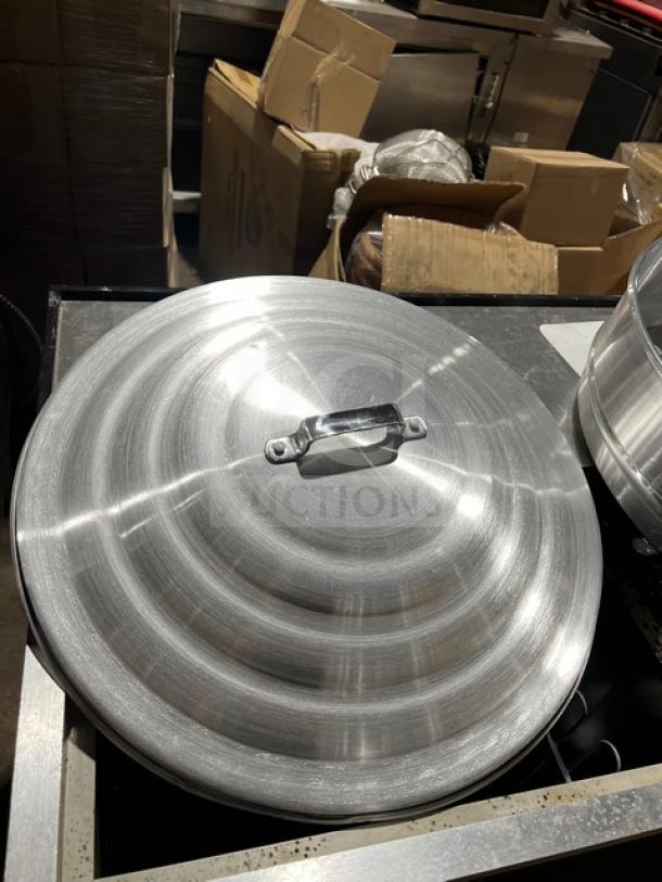 New commercial stainless steel food steamer with 3 tiers, featuring a sleek, polished finish.