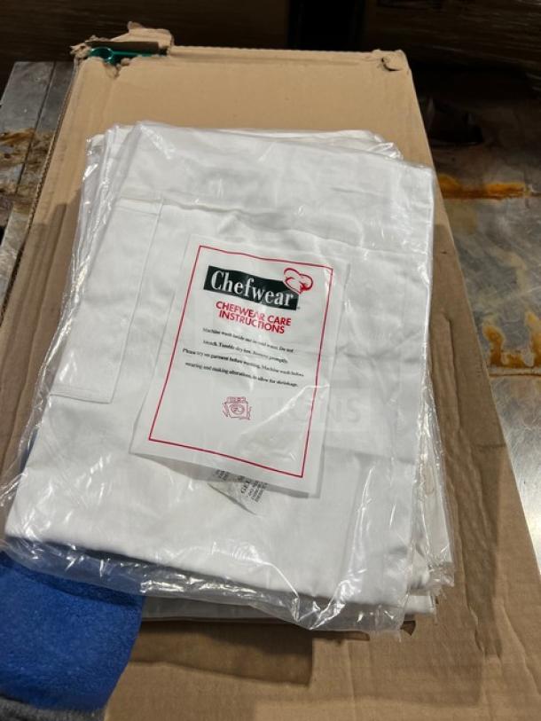 Chefwear white textured chef coat, model 1620-40, new in packaging with care instructions visible.