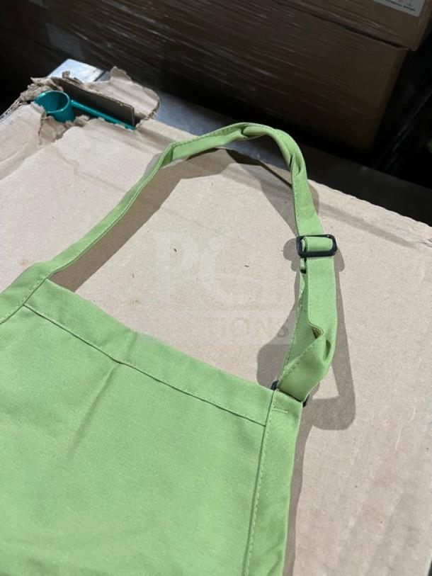 Chefwear green apron, model 1SZ, one size, new condition, adjustable neck strap, ideal for bar or kitchen use.