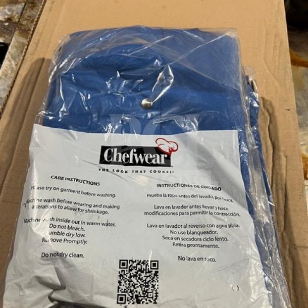 Chefwear Model 4931 blue bar jacket, polyester/cotton blend, 4X size, brand new in packaging, single-breasted.