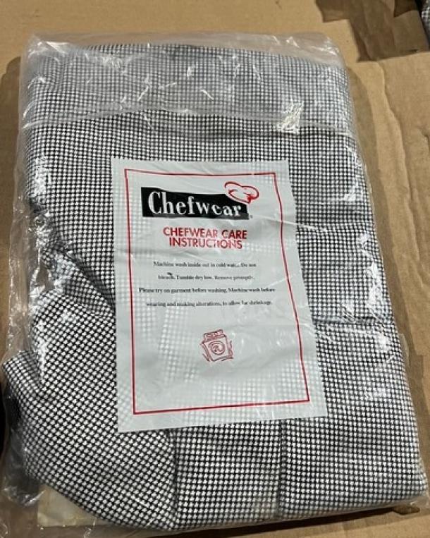 Brand new Chefwear cargo chef pants, model 3200-11-4X, size 4X. Black and white checkered. In original packaging.