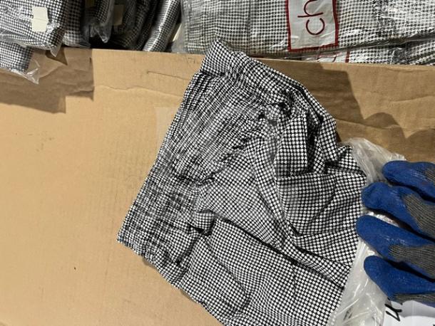 Brand new Chefwear CW3200 cargo chef pants, size L, black and white checkered pattern, packaged with tags.