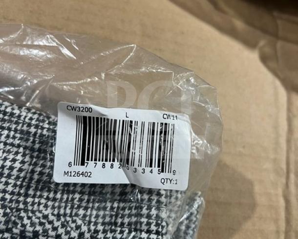 Brand new Chefwear CW3200 cargo chef pants in package, size L, black and white pattern, labeled for commercial use.