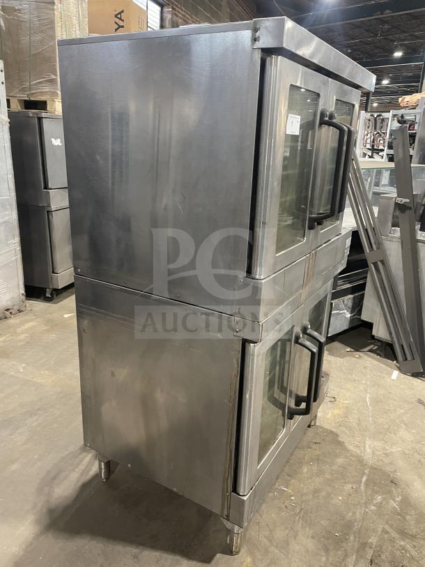 Vulcan VC4GD-10 double-stacked stainless steel convection oven, gas-powered, Energy Star certified, on casters, with wired rack.